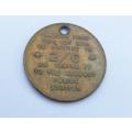 A vintage South African lost key token entitling the finder to 2 shillings and 6 pence