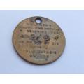 A vintage South African PO lost key token entitling the finder to 2 shillings and 6 pence