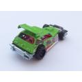 A die cast metal model of a dirt buggy by Mattel
