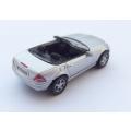 A miniature die cast metal model of a Mercedes Benz Cabriolet