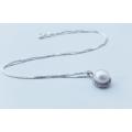 A genuine sterling silver necklace and genuine Mabe pearl pendant - Brand new - Boxed