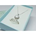A genuine sterling silver necklace with mabe pearl pendant + sterling silver heart motif ring