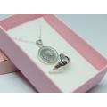 A sterling silver necklace with a sterling silver coin pendant + sterling silver Claddagh ring - NEW