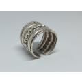 An unusual solid sterling silver adjustable cuff style ring
