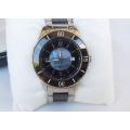 A weighty divers style ladies watch in excellent working condition with box - TITAN