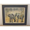 A vintage original oil on board painting of elephants signed Judy and dated 1973