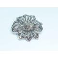 A gorgeous vintage solid silver brooch filled with marcasite