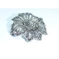 A gorgeous vintage solid silver brooch filled with marcasite