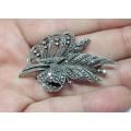 A magnificent vintage solid sterling silver leaf form brooch filled with marcasite