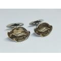 A posh vintage pair of 800 silver (80%) cufflinks with golden accents