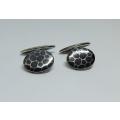 A vintage pair of European 800 ( 80% ) silver cufflinks with spotty design