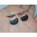 A vintage pair of European 800 ( 80% ) silver cufflinks with spotty design