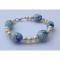 A gorgeous handmade genuine sea Pearl and art glass bead bracelet with sterling silver clasp