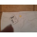 White Skinny Jeans with Silver Zips & Buttons. Size 10 available