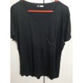 Black ladies T shirt with pocket Size Large