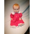 Vintage Doll with dress - good condition