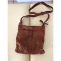 Buy beautiful tan genuine leather crossover handbag