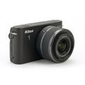 Nikon 1 J1 Mirrorless Digital Camera with 10-30mm VR Zoom Lens¿
