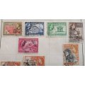 8 PAGES OF BRITISH COLONIAL STAMPS