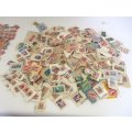 HUNDREDS AND HUNDREDS OF SOUTH AFRICAN STAMPS ON AND TAKEN OFF ENVELOPES--UNRESEARCHED