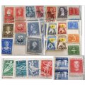 3 PAGES OF NETHERLANDS STAMPS---Hinged