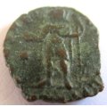 AN ANCIENT COIN -INTERESTING CLIPPED COIN--SOLDIER HOLDING GLOBE AND SPEAR (B)--337 to 361 AD