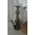Vintage brass candle stand in basket