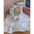 Cutest vintage Porcelain baby doll in frilly dress