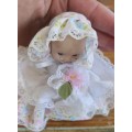 Cutest vintage Porcelain baby doll in frilly dress