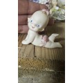 Cute porcelain cupie doll