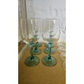 Wine glasses with green stems