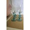 Wine glasses with green stems