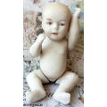 VINTAGE,  BISQUE MINI BABY DOLL WITH MOVING ARMS AND LEGS, NEEDING MOM TO SEW HIM / HER AN OUTFIT