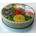 VINTAGE BISCUIT OR TOFFEE TIN, PRETTY EMBOSSED  WITH ROSES AND OTHER GARDEN FLOWERS