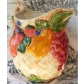 LARGE VINTAGE CERAMIC JUG, BRIGHT AND CHEERFUL COLOURS DECORATED WITH EMBOSSED FRUIT