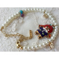 FASHION DESIGNERS ANNA SUI CHILDRENS JEWELLERY FAUX PEARL WITH CHARMS  BRACELET