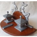 ART DECO, DESK TIDY AND PEN REST, GLAMOUROUS PEWTER LADYS AND LIDDED POTS ON WOODEN STAND.