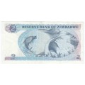 Zimbabwe two dollars 1980 banknote AU - AA series