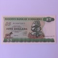 Zimbabwe 4th issue Five Dollars Harare 1994 uncirculated ZW16