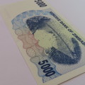 Zimbabwe Bearer cheque issued 1/2/2007 uncirculated $5000 AA0454300 ZW 77