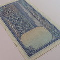 Reserve Bank of Rhodesia One Dollar 13 October 1974 uncirculated with stains on lower rim of note
