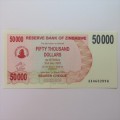 Zimbabwe Bearer cheque 1-3-2007 $50000 uncirculated AA 0602894