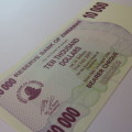 Zimbabwe Bearer cheque 1/8/2006 $10000 uncirculated 10000 with space after 10 AE 8571808