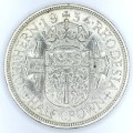 Southern Rhodesia 1934 Half Crown UNC - Some light nicks and bag marks - Book value of R7500