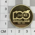Bayer 100 year medallion in plastic holder