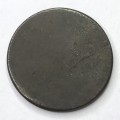 Unknown token - Says `plated` on one side - Also a star and some marks