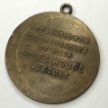 Sales House Good Conduct token medallion