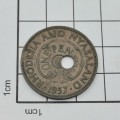 1957 One penny with totally misaligned center hole