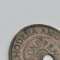 1957 One penny with totally misaligned center hole