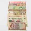 Lot of 8 International bank notes - some well used